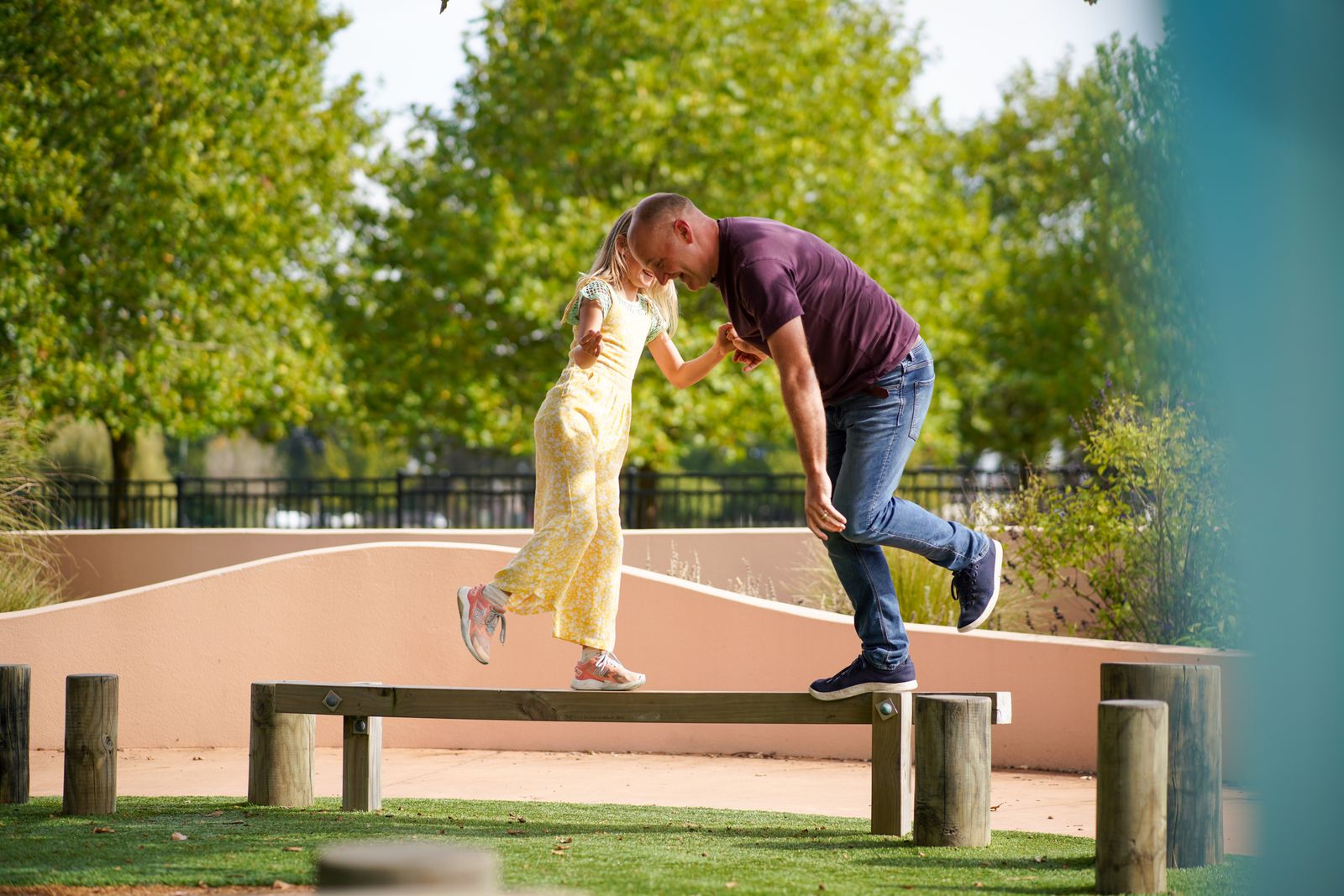 A parent and child outdoors